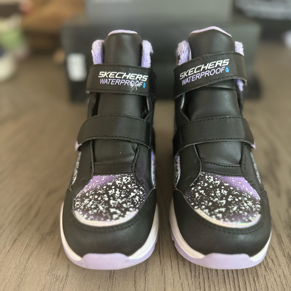 Never worn, light up water proof girls boot/sneaker